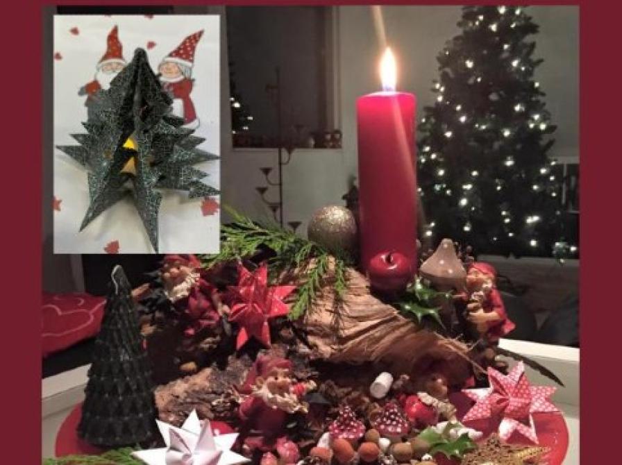 Juledekoration og et klippet juletræ.